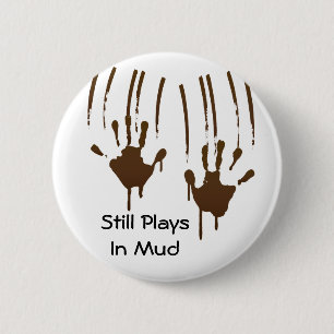 Todavía juegos en botón redondo del fango