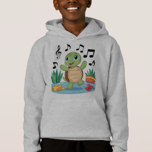 Tortuga musical junto al estanque