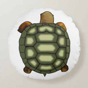 Tortuga verde moderna sobre cojín redondo blanco