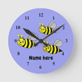 Tres abejas en un reloj de pared acrílico azul