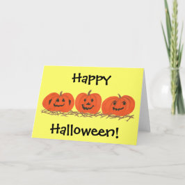 Tres calabazas felices en las tarjetas Hay Hallowe