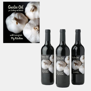 Tres etiquetas de botellas de aceite de ajo blanco