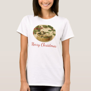 Tres gatitos en una camiseta de cesta