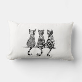 Tres gatos en fila de almohada en diseño
