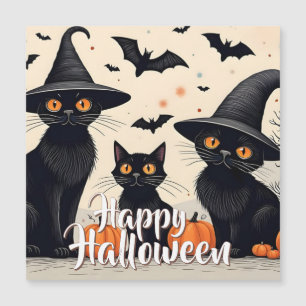 Tres gatos negros con Gorras en Halloween