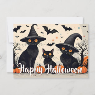 Tres gatos negros con Gorras en Halloween