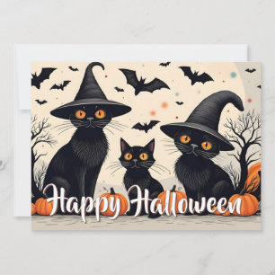Tres gatos negros con sombreros en Halloween