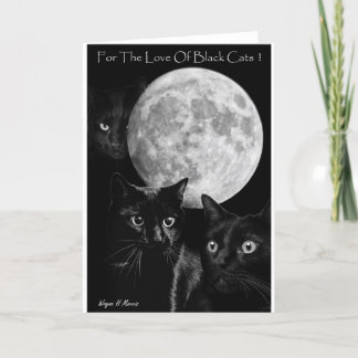 Tres gatos negros y la tarjeta de felicitación de