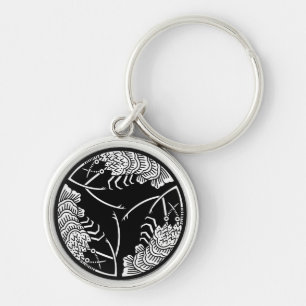 Tres llaveros de langostas espinosas cabeza con co