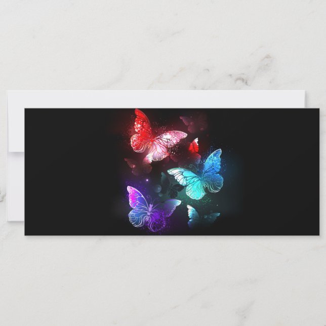 Tres mariposas brillantes en el fondo nocturno (Anverso)