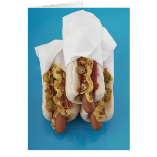 Tres perros calientes en bollos