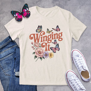 Triblenda Alarmando la divertida mariposa y la camiseta flor