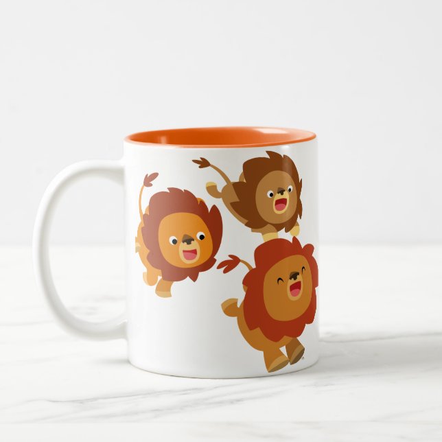 Trío feliz de la taza linda de los leones del (Izquierda)