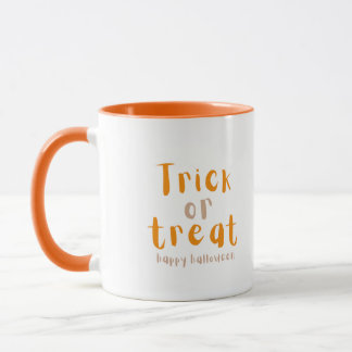 Truco moderno de Halloween o taza de tratamiento