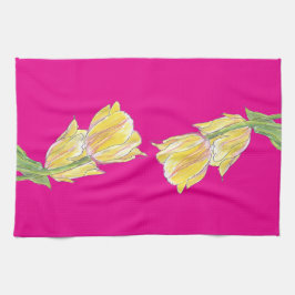 Tulipanes amarillos y rosados sobre una toalla de 