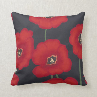 Tulipanes rojos brillantes en negro, almohadas