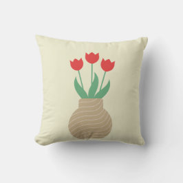 Tulipanes rojos en la almohada de jarrón