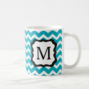 Turquesa y taza de café negra del monograma de
