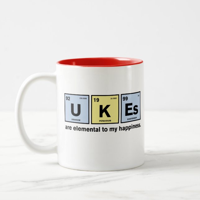 Ukulele y taza divertidos de la ciencia (Izquierda)
