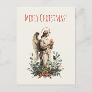 Un ángel de Navidad con vela y hojas