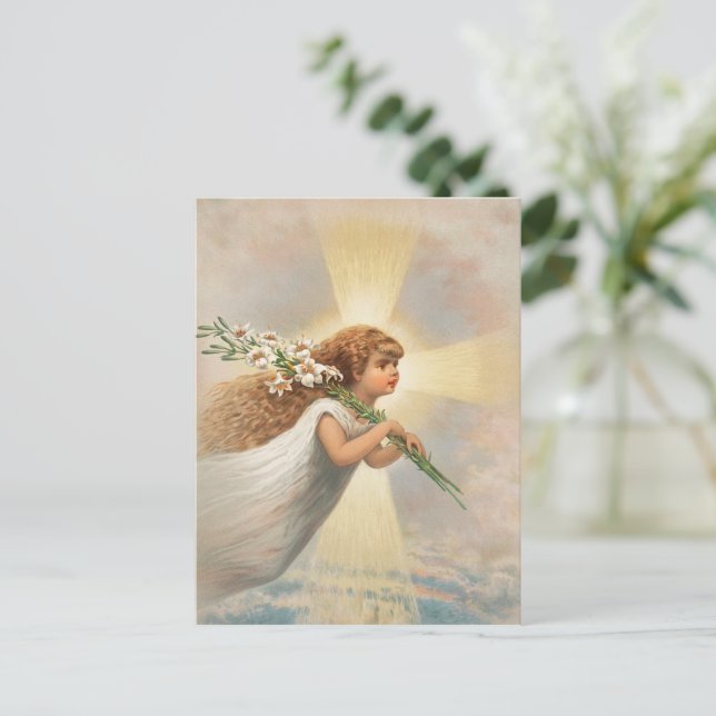Un ángel en el cielo sosteniendo lirios navidad (Anverso de pie)