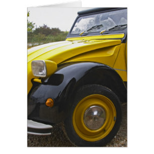 Un antiguo Citroen negro y amarillo 2CV 2 CV,