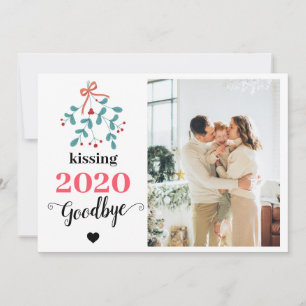 Un beso de Mistletoe rojo a la diversión del 2020