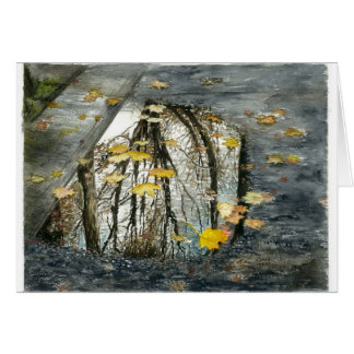Un charco en la calle en noviembre