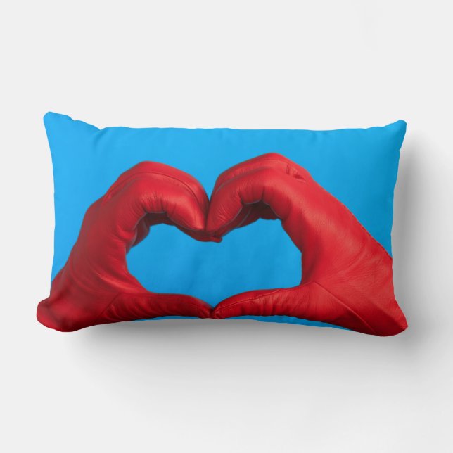 UN COJÍN DE CUERO ROJO EN FORMA DE CORAZÓN LUMBAR (Anverso)