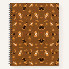 Un cuaderno espiral con una cubierta marrón