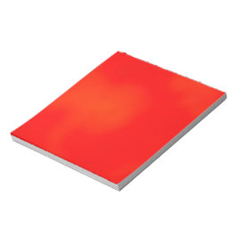 Un cuaderno rojo vibrante con un diseño sutil