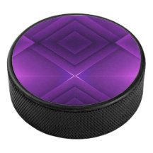 Un disco de hockey redondo morado con un geométric