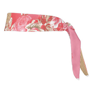 un diseño de fondo rosa y dorado con un rojo