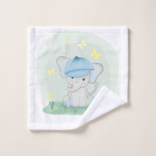 Un elefante lindo en un prado de flores.
