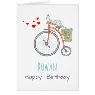 Un gato azul en una bicicleta roja de época