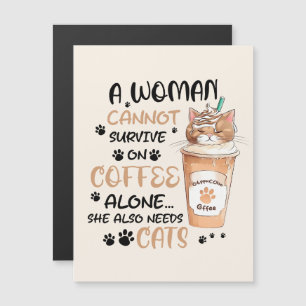 Un gato lindo y una taza de café