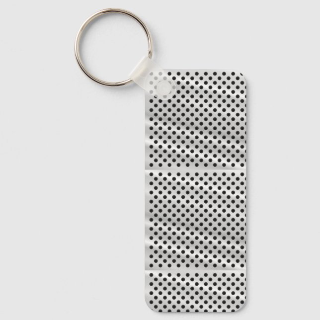 Un llavero rectangular con un aro metálico (Anverso)