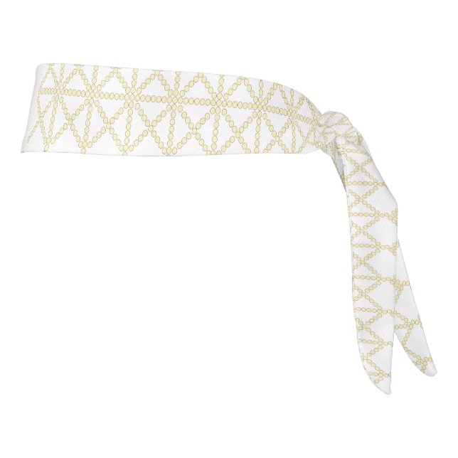 un patrón geométrico blanco y dorado (Girar 90)