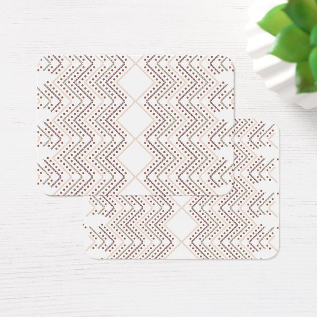 Un patrón geométrico repetido con formas de diaman (Escritorio)