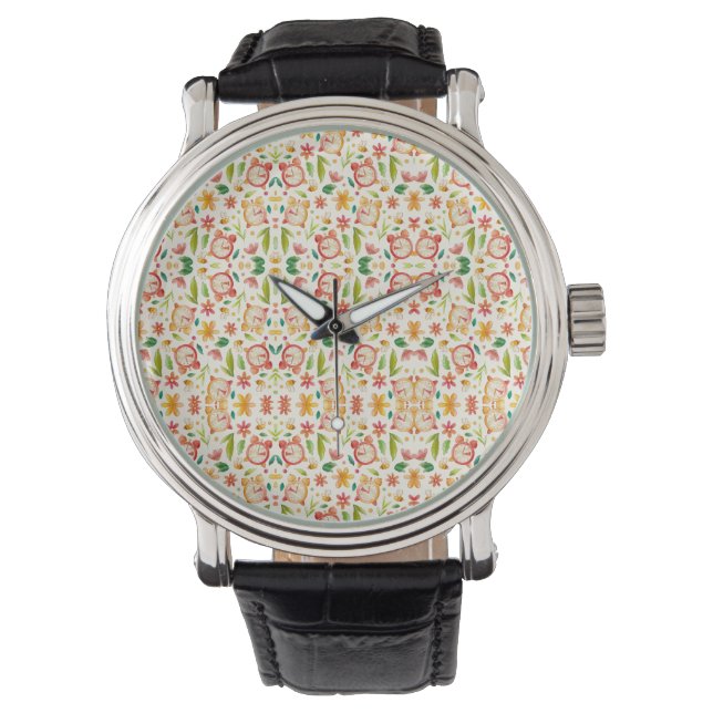 Un reloj de pulsera con una cara con estampado flo (Anverso)
