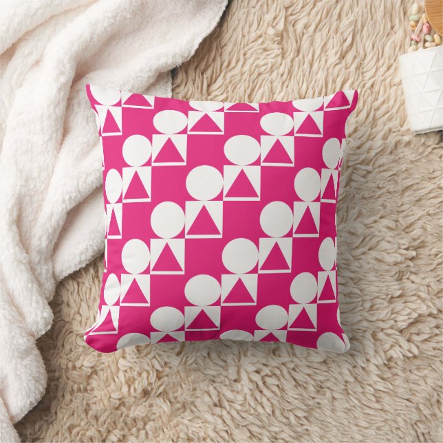 Una almohada con un círculo, un triángulo y un pat (Manta)