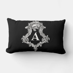 Una almohada decorativa con inicial de monograma
