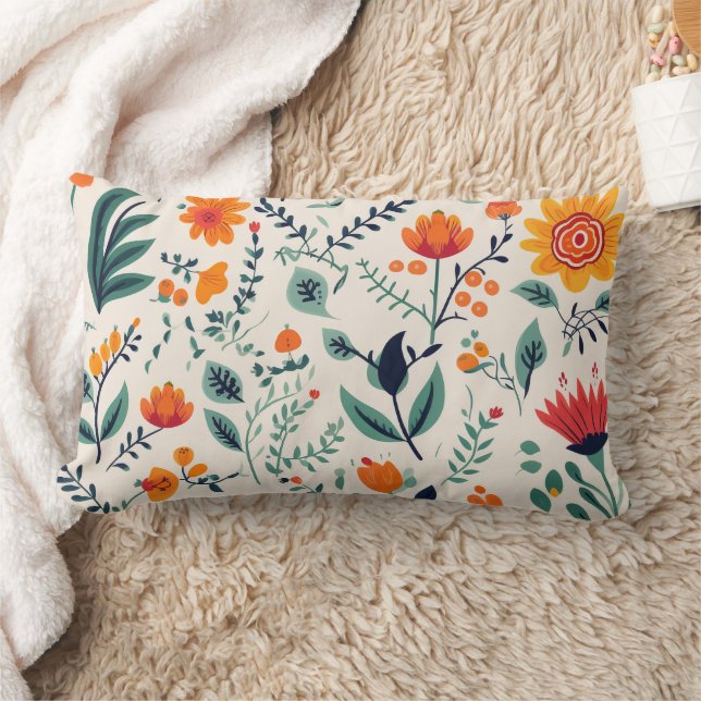 Una almohada decorativa con un floral vibrante (Manta)