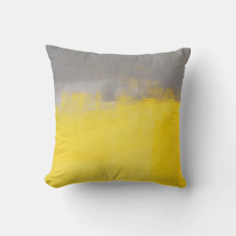 "" Una almohada gris y amarilla abstracta simple