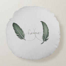 Una almohada redonda con un diseño minimalista.