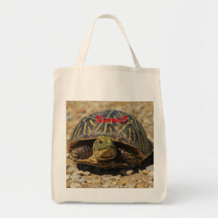 Una bolsa de tocador con caparazón de tortuga de K