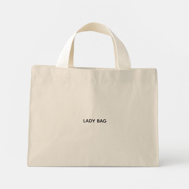 Una bolsa tote beige con asas blancas (Reverso)