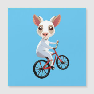 Una cabra blanca en una bicicleta