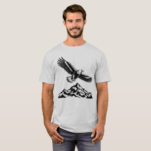 Una camiseta gris de águila volando sobre las mont