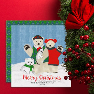 Una familia de osos polares guisando Feliz Navidad